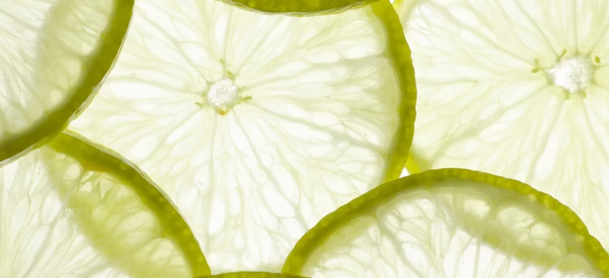Pile of fresh limes on a table